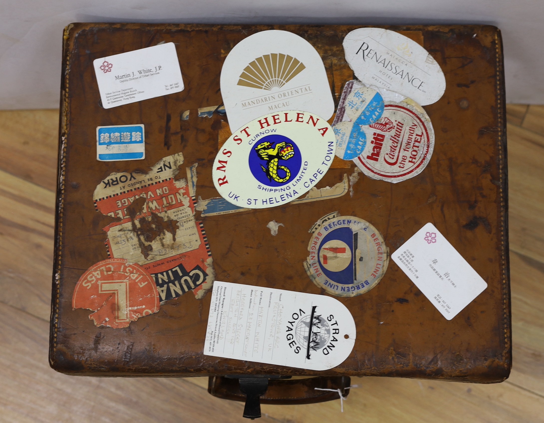 A selection of vintage travel cases together with buoy plaques (quantity)
